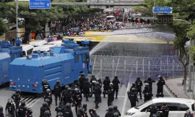 Thai Politicians Flee Parliament as Protesters Clash with Thai Police