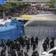 Thai Politicians Flee Parliament as Protesters Clash with Thai Police