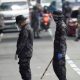 Philippine Police Threaten to Cane Covid-19 Rule Violators