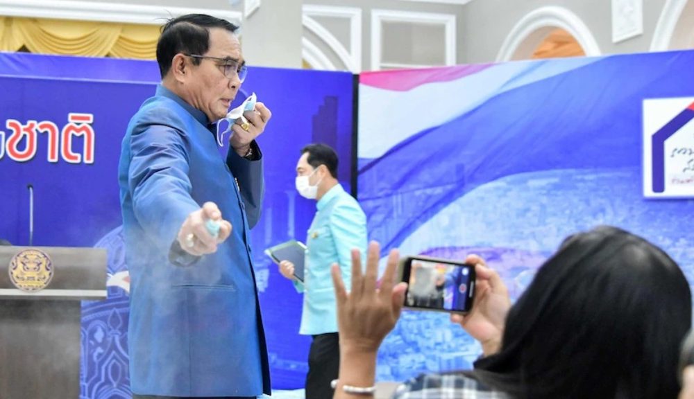 Frustrated Thai Prime Minister Sprays Hand Sanitizer on Reporters