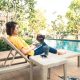 People Escaping Pandemic to Enjoying Summer on Patio Garden Sunloungers