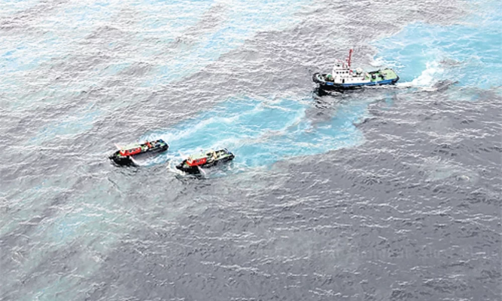 Navy Races to Stop Crude Oil Spill from Hitting Beaches