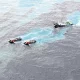 Navy Races to Stop Crude Oil Spill from Hitting Beaches