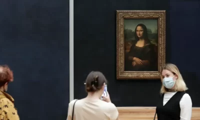 The Mona Lisa by Leonardo da Vinci is pictured at the Louvre museum in Paris, Wednesday, May 19, 2021. The man, who appeared to be a woman in a wheelchair, threw a piece of cake at the glass protecting the Mona Lisa on Sunday May 29, 2022 at the Louvre Museum, urging people to remember the planet Earth. (AP Photo/Thibault Camus, File)