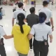 Business Coupe Extradited from Thailand to Face Charges in US