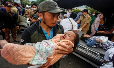 Indonesian Rescue Workers Race to Find People Still Trapped in Rubble After a deadly Earthquake