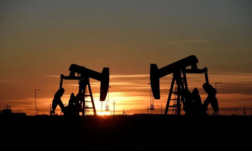 Oil Climbs as Dollar Slips, and Supply Fears Keep a lid on Gains
