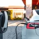In North America, Tesla has a network of chargers that, for the most part, can only charge Tesla automobiles as one of its main competitive advantages. According to Tesla, there are two times as many Tesla chargers as so-called CCS chargers, the kind used by Ford, General Motors, Audi, Rivian, and other automakers. Currently, Tesla is inviting other automakers to design vehicles with charging ports compatible with its charging format as well as other charging businesses, such as EVGo, ChargePoint, and Electrify America, to upgrade their chargers with Tesla-style plugs. However, it's not yet known if or when other businesses will decide to accept Tesla's offer. With a straightforward adapter that slips over the charging connector, Tesla owners have had access to CCS chargers for a long time. But having a Tesla-style charging cord would simplify the procedure and eliminate the need to buy an adaptor. Tesla has now given the cord the name "North American Charging Standard," or NACS, though it is not an official designation by any government body. The ability to utilise a Tesla Supercharger, the company's term for its rapid chargers, for non-Tesla vehicles has been more challenging and at best calls for a specialised adapter acquired from another business. Due to variations in how cars connect with the charger, it might not function even then. Driving a vehicle with a NACS charging port in the Tesla design will make it much simpler. But to date, neither manufacturers nor charging businesses have indicated they intend to accept Tesla's offer, which was made public in a blog post on Friday. The business and its CEO, Elon Musk, have previously discussed making its charging network available to vehicles other than Teslas. The business started doing this in Europe, where Tesla vehicles come with European-specific CCS-style charging connections, which are the industry standard. The charging company EVGo offered a temporary offer for Tesla drivers with a CCS adapter to use EVGo fast charging stations without paying monthly subscription costs on the same day Tesla unveiled its offer for other businesses to utilise its charging format. Tesla drivers can utilise the EVGo phone app to plug in and instantly begin a charging session under the current Autocharge+ EVGo plan. According to EVGo Commercial Officer Jonathan Levy, the timing of the company's promotional release was accidental, and there are no current plans for EVGo to begin installing Tesla charging cables at its stations. In the past, Tesla has offered to let other businesses utilise certain technologies that are protected by Tesla patents, but doing so required that they follow Tesla's "Patent Pledge." In order to use any Tesla technology, businesses had to sign an agreement stating that they would not sue Tesla or assist any other business in doing the same. This effectively turned Tesla's offer of intellectual sharing into a two-way street. It's not clear if the use of the NACS charging standard is covered by Tesla's Patent Pledge. Tesla, which ordinarily doesn't reply to inquiries from the media, didn't respond to emails on the subject. The Society of Automotive Engineers' (SAE) editorial director, Bill Visnic, asserted that he would not anticipate automakers accepting Tesla's offer. CCS is a standard that was created by the SAE and a group of automakers. He said that "a lot of significant work and collaboration" had gone into it. But even Visnic acknowledged that Tesla chargers are frequently more dependable and user-friendly than conventional public chargers. Since Tesla already has a larger network of chargers and many Tesla drivers can easily use an adapter, Visnic predicted that charging companies will want to keep their chargers using the CCS standard. (Some Tesla models are incompatible with CCS adapters.) However, Jim Burness, CEO of National Car Charging, a reseller of equipment to the EV charging sector, suggested that charging businesses could wish to add these cables since it might attract new clients. Burness drives a Tesla for personal use. Because the socket is already there on the station, he said, "this will help owners of the older Teslas who would otherwise have to not only buy an adaptor, but also pay for a retrofit of their car." The business claims to have changed the name of their charging connector to the North American Charging Standard (NACS) and contends that this standard is preferable to CCS because of its greater technology and geographic reach.