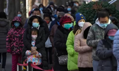China Claims 2 More COVID Deaths As Some Curbs Relaxed