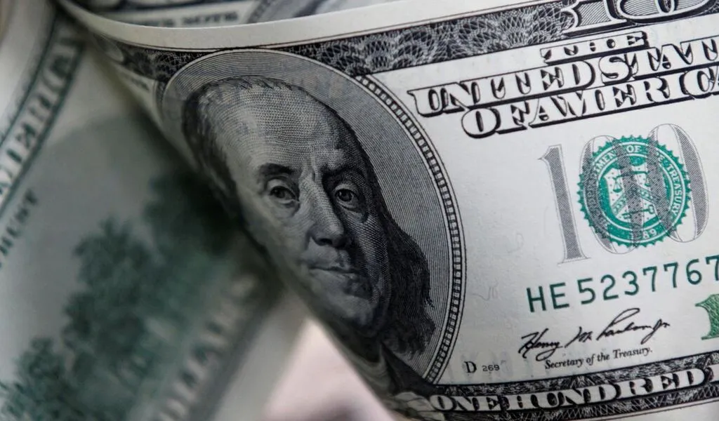 Dollar Slid After Powell Strikes a Balanced Tone on Inflation