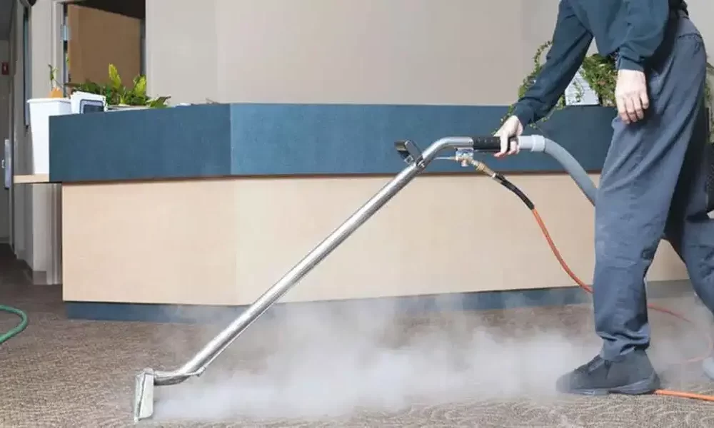 Rug Cleaning in Austin, Texas Hospital by The Steam Team and Wearing Blue Sky Scrubs in a Sterile Environment