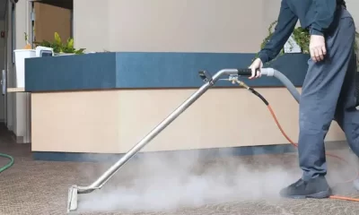 Rug Cleaning in Austin, Texas Hospital by The Steam Team and Wearing Blue Sky Scrubs in a Sterile Environment