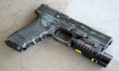 Why Do People Put Flashlights On Guns?