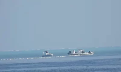 China Warns Philippines Over Removal of South China Sea Barrier