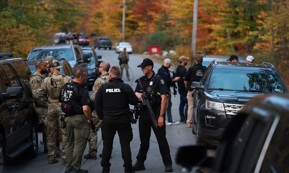 Maine Manhunt Continues for Army Reservist Who Gunned Down 18 People