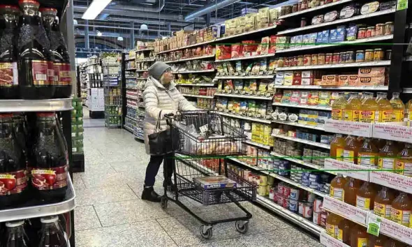 Slowing Inflation And Rising Wages Improve Americans' Economic Outlook