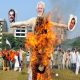Farmers in India Burn Effigy of Modi Over Brutal Attacks from Police